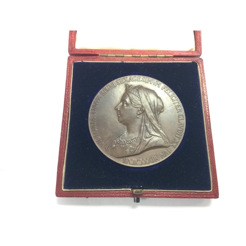 766 - A cased Queen Victoria bronze medallion.