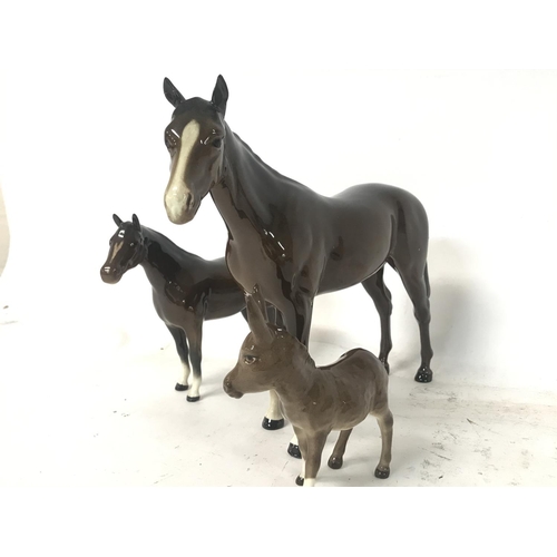 898 - Two Beswick horses and a donkey