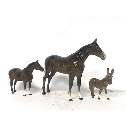 898 - Two Beswick horses and a donkey