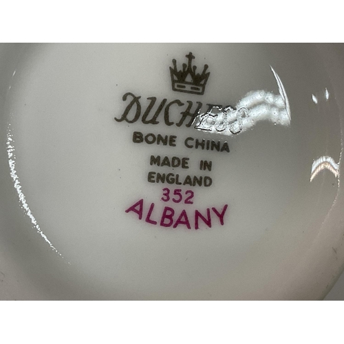 909 - A Duchess Albany tea set consisting of saucers and cups