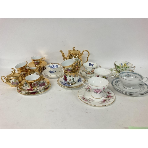 919 - A collection lot of mixed cups and saucers including Aynsley, Mikasa plus a Limage coffee set