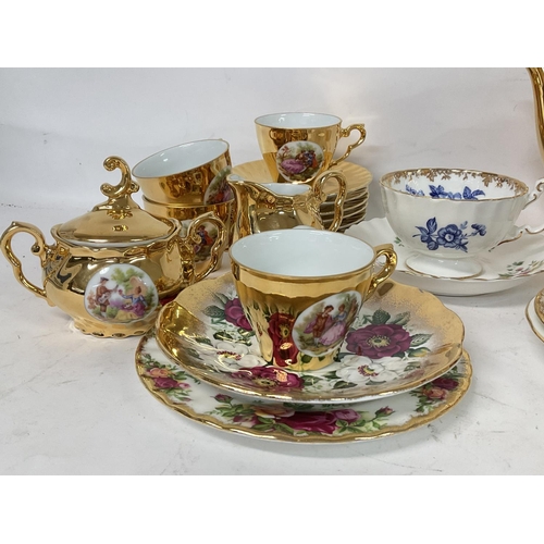 919 - A collection lot of mixed cups and saucers including Aynsley, Mikasa plus a Limage coffee set