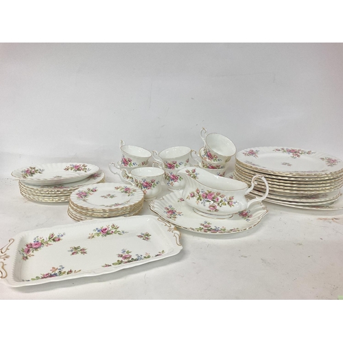 931 - Royal Albert moss rose dinner & teaset consisting of cups, plates a tea pot etc