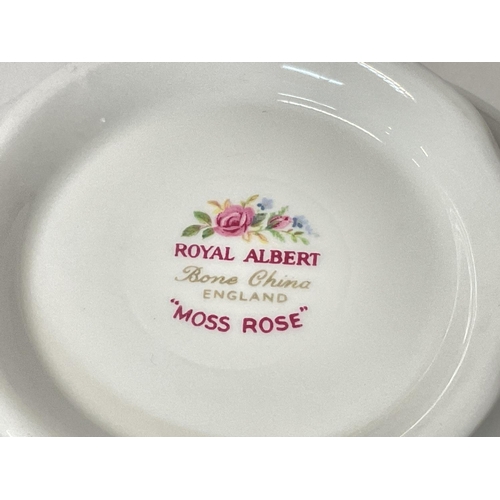 931 - Royal Albert moss rose dinner & teaset consisting of cups, plates a tea pot etc