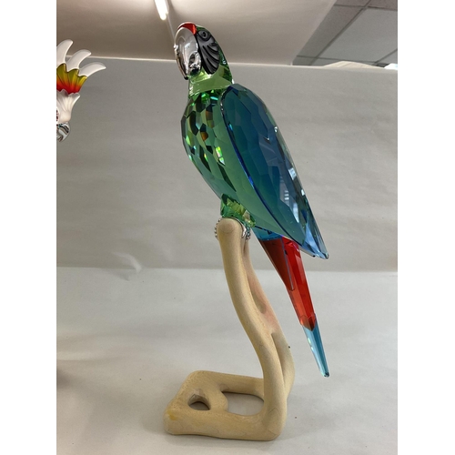 975 - Two large Swarovski birds on wooden stands, in fitted boxes, with certificates. Red Cockatoo and Gre... 