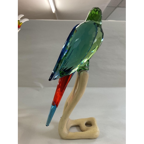 975 - Two large Swarovski birds on wooden stands, in fitted boxes, with certificates. Red Cockatoo and Gre... 