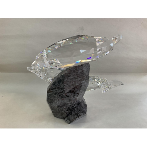 977 - A large Swarovski dolphins scene, mounted on base, in fitted box with certificates