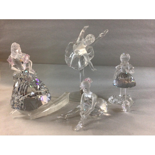 997 - Four Swarovski figures including Cinderella- fleeing with a missing shoe, Two Ballet dancers and a g... 