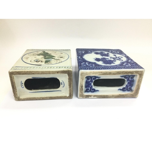 1010 - Two Oriental ceramic opium pillows comprising a blue and white example and one other decorated with ... 