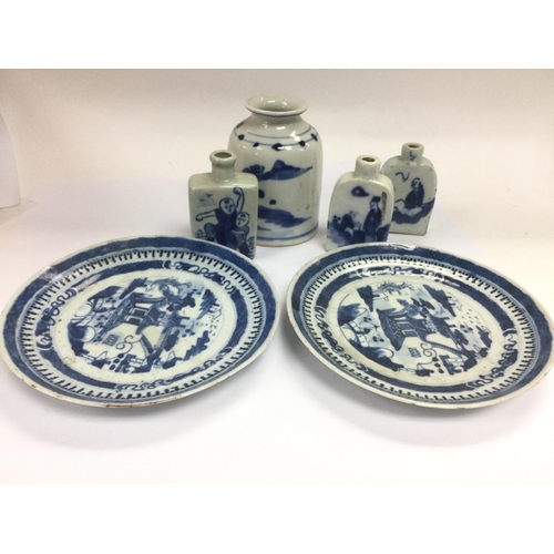 1011 - A small collection of blue and white Oriental ceramics comprising a pair of plates, scent bottles et... 