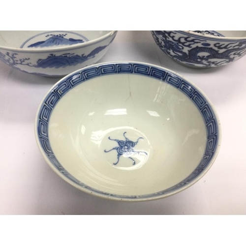 1020 - Four blue and white bowls, largest diameter approx 18cm. Shipping category D.