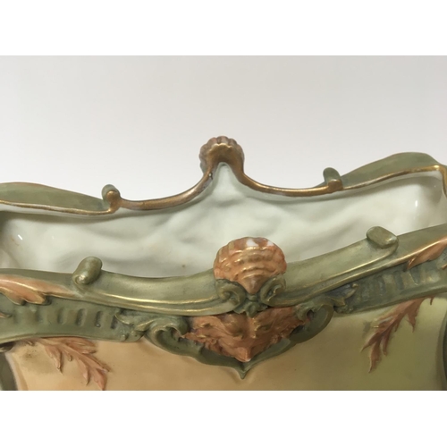 1133 - A large Classical design Royal Worcester vase with stylised dolphin. Some restoration. Height 20cm w... 