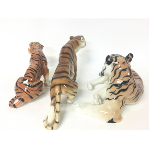 1156 - Made in the USSR porcelain tigers, variating from 22 to 32 cm long approximately.