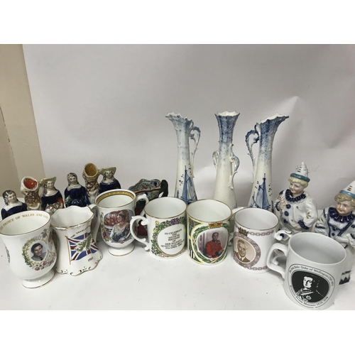 1177 - A collection of royal commemorative mugs , three Dutch ceramic flower vases, a masons jug and other ... 