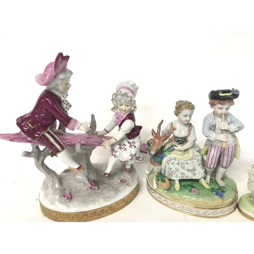 1227 - A collection of early 20th century Dresden porcelain figures including two small sheep and other fig... 