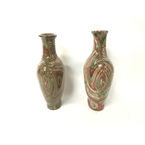 1231 - A pair of similar Agade ware vases, approximately 23cm tall (D)