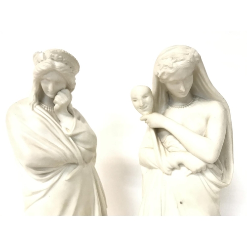 1232 - A pair of Victorian Parian ware figurines, approximately 32cm tall. (D)