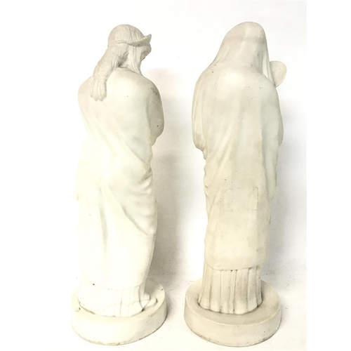 1232 - A pair of Victorian Parian ware figurines, approximately 32cm tall. (D)