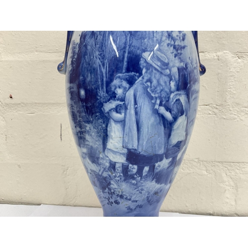 1297 - A Victorian blue art vase, 38cm tall (D)