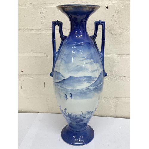 1297 - A Victorian blue art vase, 38cm tall (D)