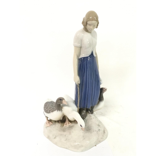 1305 - B&G Bing & Grondahl Copenhagen Denmark Porcelain figure of a girl with geese, approximately 25cm tal... 