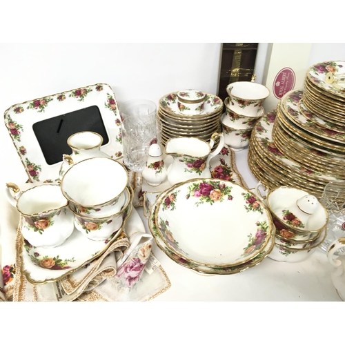 1339 - A large collection of Royal Albert Old Country Roses including tea cups, saucers, plates, jugs, clot... 