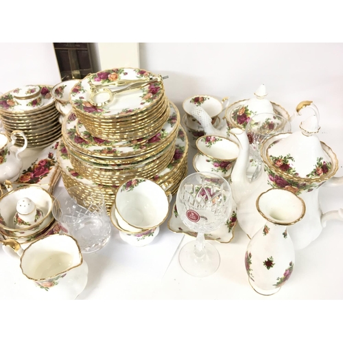 1339 - A large collection of Royal Albert Old Country Roses including tea cups, saucers, plates, jugs, clot... 