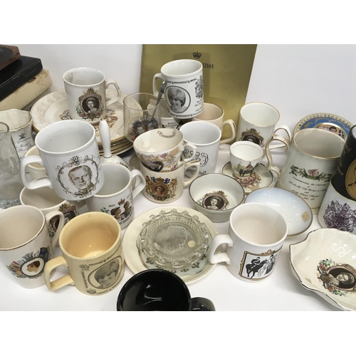 1353 - Two boxes of Elizabeth II and other commemorative ceramics including tea cups, ashtrays, plates etc ... 