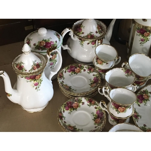 1359 - A collection of Royal Albert old English Country Rose tea and coffee set with tea pot (a lot)