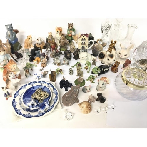 1361 - A large collection of miniature ceramic figured including Wade, Beswick, Beatrix potter, Lenox etc (... 