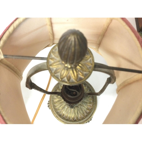 1404 - An electric brass lion claw feet table lamp, approximately 30cm tall