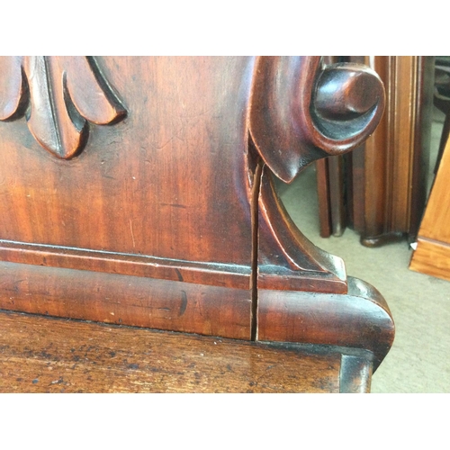 1440 - A Victorian Mahogany hall chair, in need of restoration due to cracks. 42x36x90xm approximately.