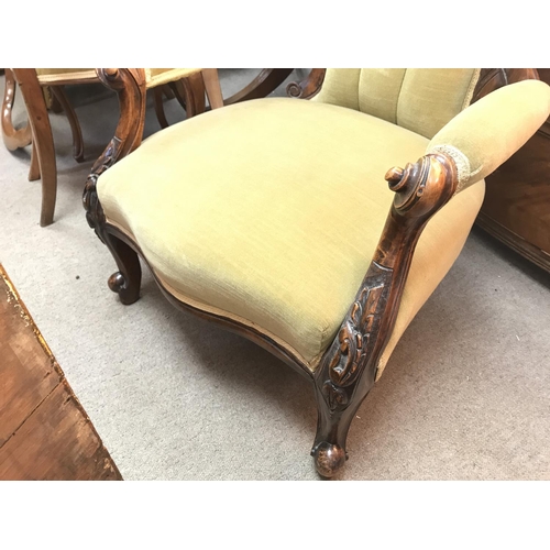 1459 - A Victorian mahogany open arm chair upholstered in green, 56x60x100cm approximately.