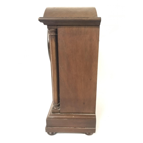 1464 - An Edwardian inlaid mahogany mantle clock, with key. 24x13x32cm approximately. (D)