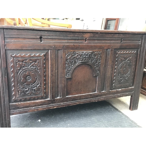 1468 - Stained oak early 18th century chest with floral carvings, 114x64x50cm approximately