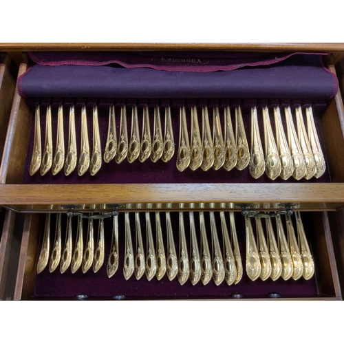 1490 - A quality yew wood canteen with full gilt cutlery service. 97cm x 51cm x 85cm