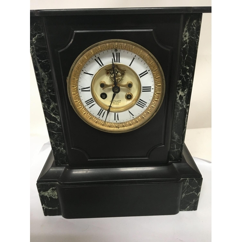 1510 - A Victorian French black slate and marble mantel clock the dial with visible pendulum the movement s... 