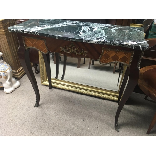 1514 - A French style marble top table , with applied gilt metal, on cabriole legs 92 cm 36 cm .