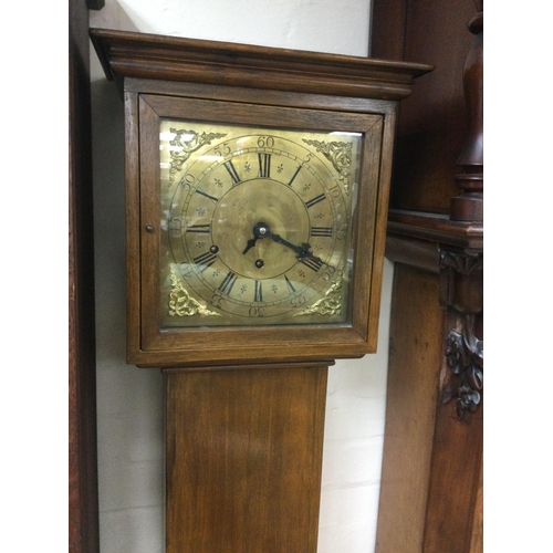 1516 - A walnut longcase clock with a brass dial, approx height 178cm. Shipping category D.