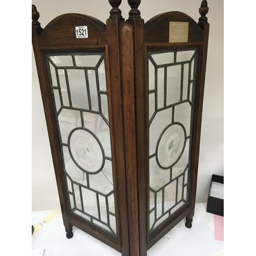 1521 - A Mahogany fire screen with lead light panels with applied plaque House of commons.