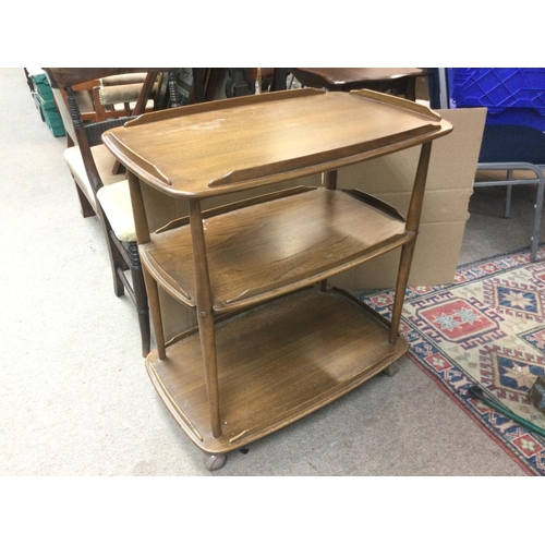 1534 - An Ercol three tier tea trolley, approx 71cm x 46cm x 77cm.