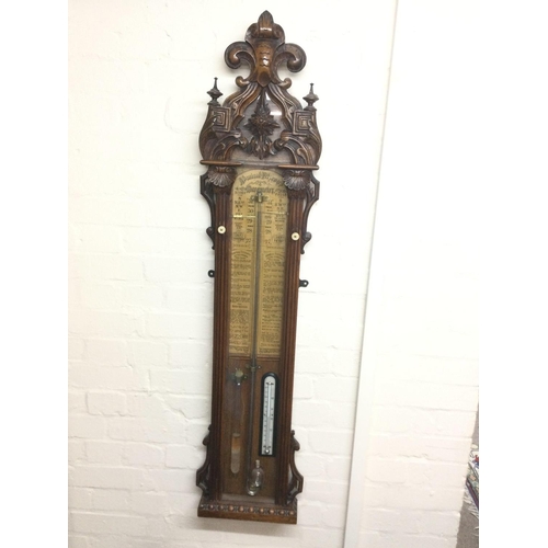 1539 - A late Victorian carved oak Admiral Fitzroy barometer, approx height 128cm.