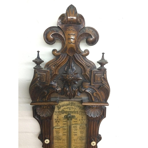 1539 - A late Victorian carved oak Admiral Fitzroy barometer, approx height 128cm.