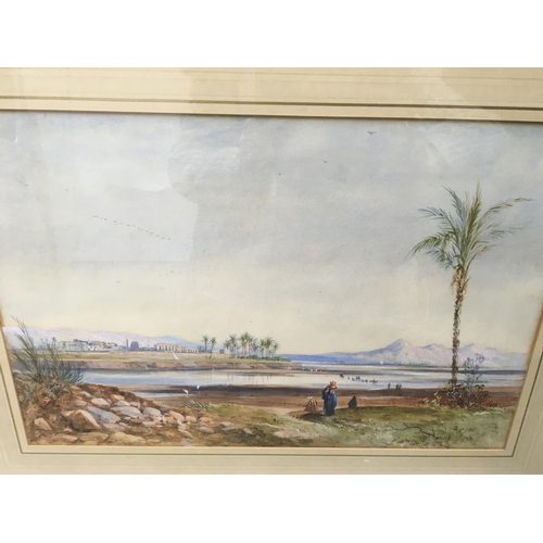 1549 - Two framed unsigned watercolours depicting winter view and Eastern landscape. Measuring 22cm x 34cm ... 