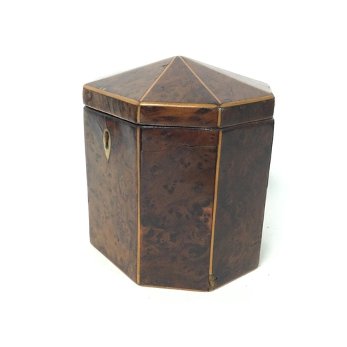 874 - A George III burr yew-wood Tea Caddy of octagonal form with a hinge lid and boxwood lines, with key.... 