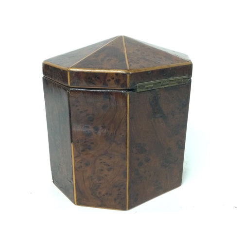 874 - A George III burr yew-wood Tea Caddy of octagonal form with a hinge lid and boxwood lines, with key.... 