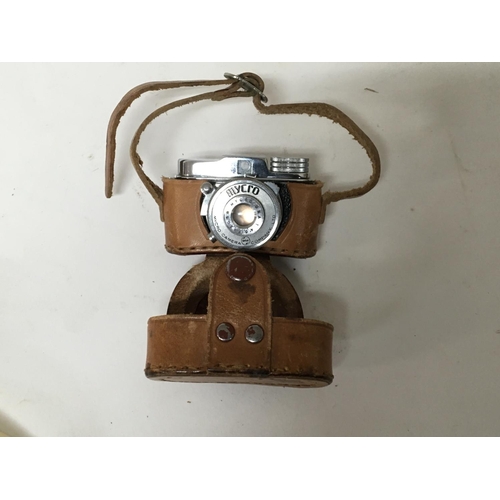 883 - A miniature Mycro camera in a fitted leather case. NO RESERVE