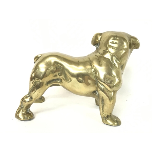 891 - A vintage solid cast bronze bull dog, approximately 15cm tall and 20cm long.