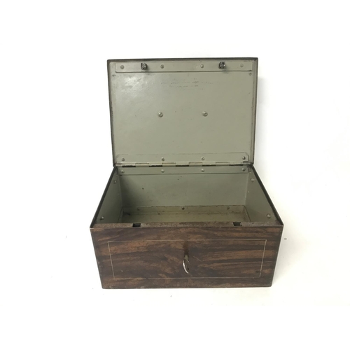 892 - A vintage simulated rosewood metal cash box with key 18x25x12cm