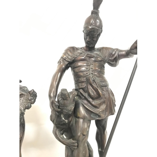 898 - Two spelter figures, a Greek warrior (42cm tall) & two children (32cm tall).